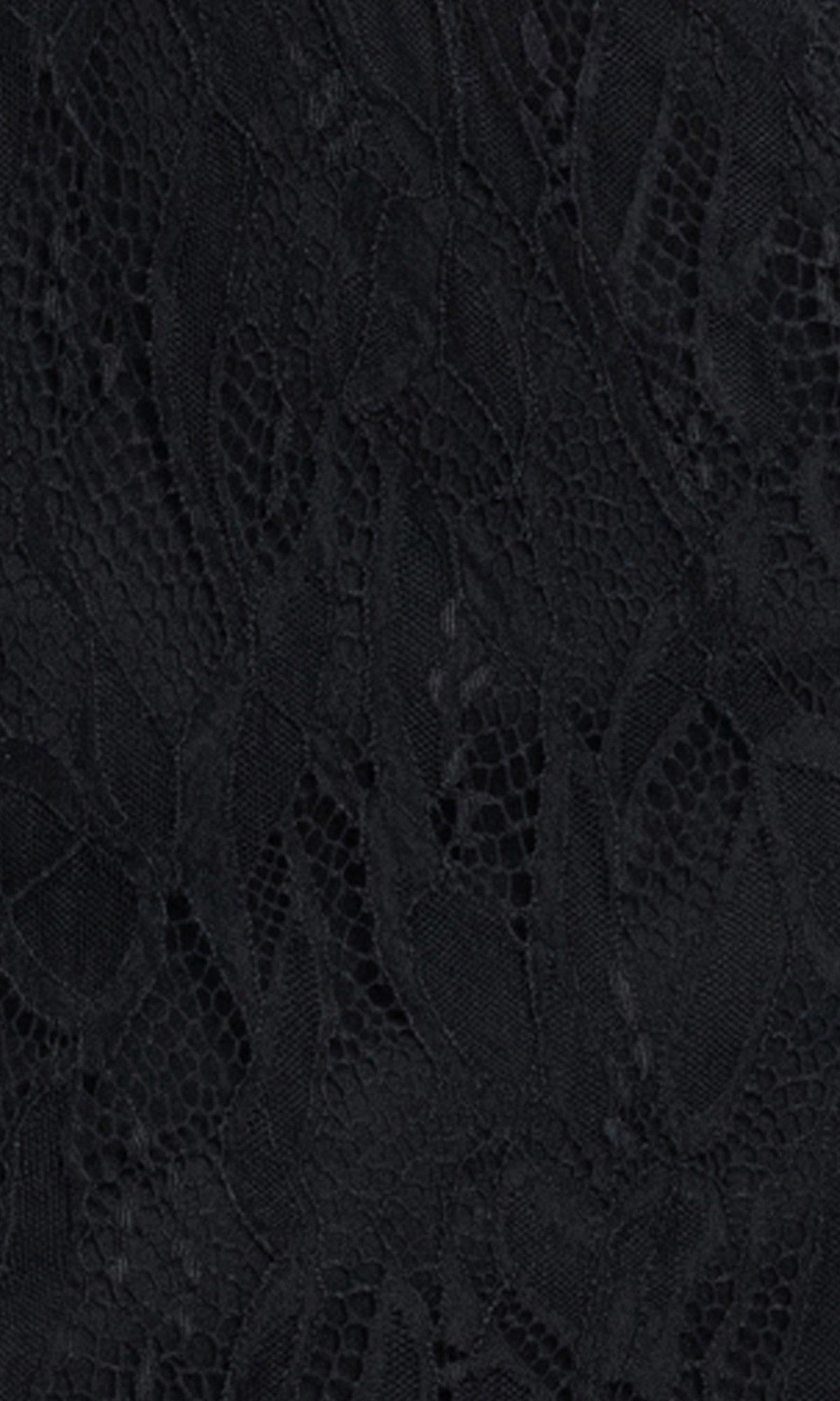 Close-up of black lace fabric with a floral pattern and sheer netting, showcasing the intricate details and texture of the Black Mini Hoco Dress: Blondie Nites 6372BN—perfect for a homecoming dress or mini hoco dress featuring a beaded corset.